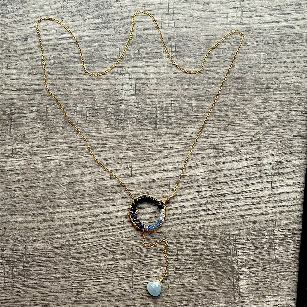 14K gold filled lariat style necklace with blue shaded ombre sapphires